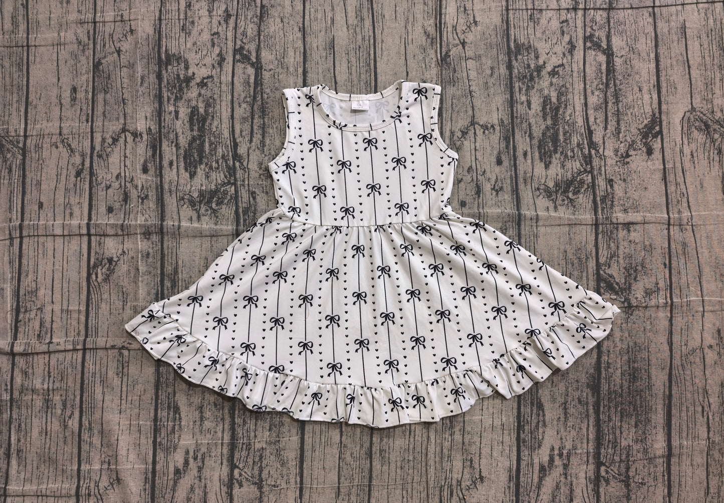 pre order sleeveless black bow heart dress