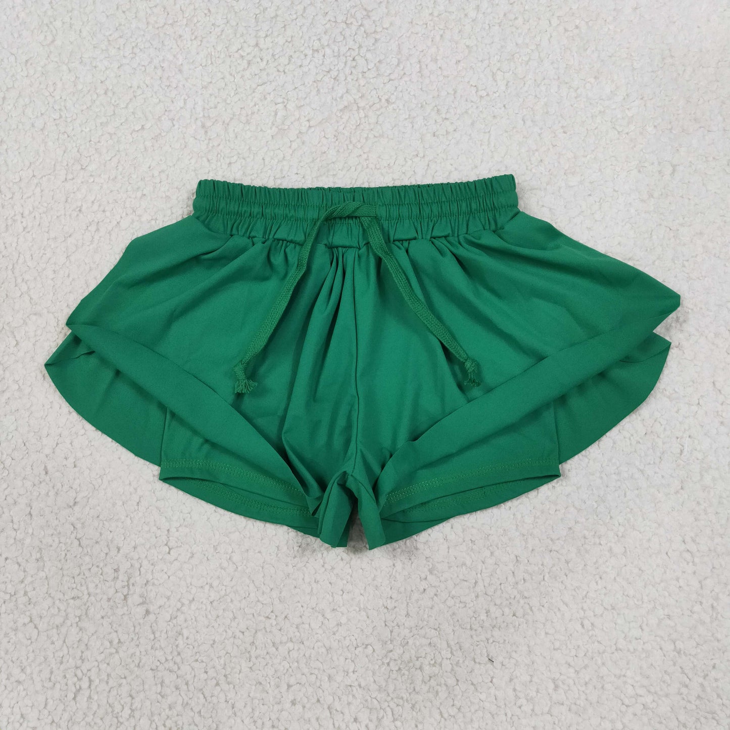solid green athletic butterfly shorts