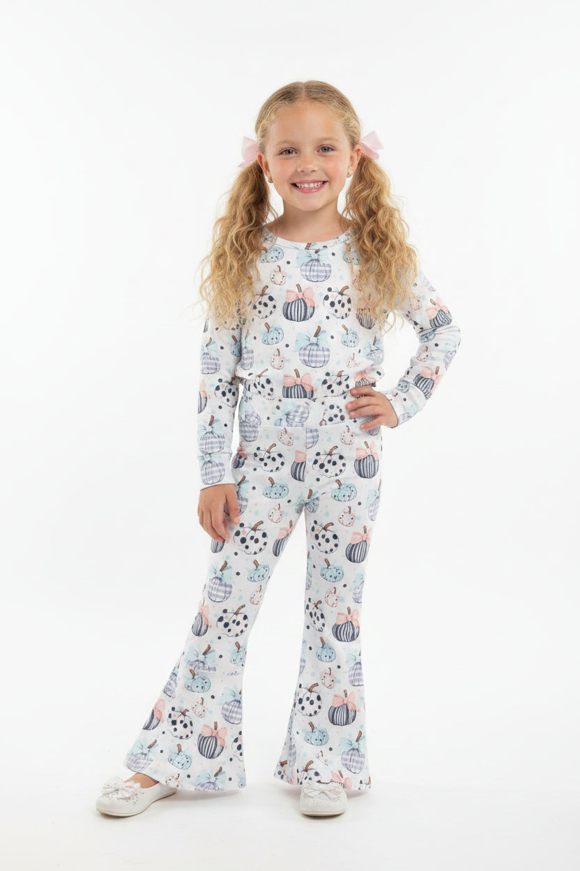 girl pumpkin shirt pants outfit