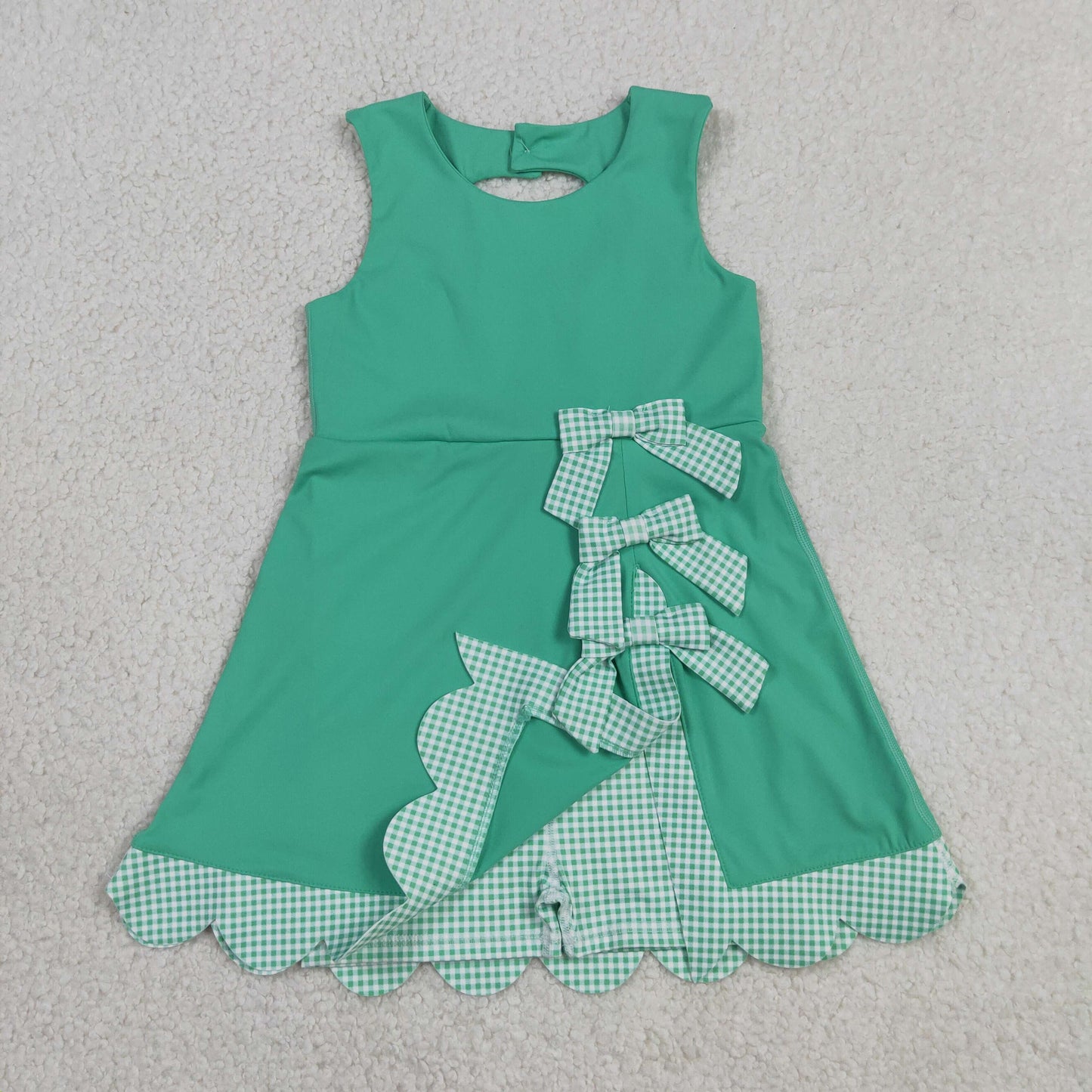 green sleeveless athletic scallop dress