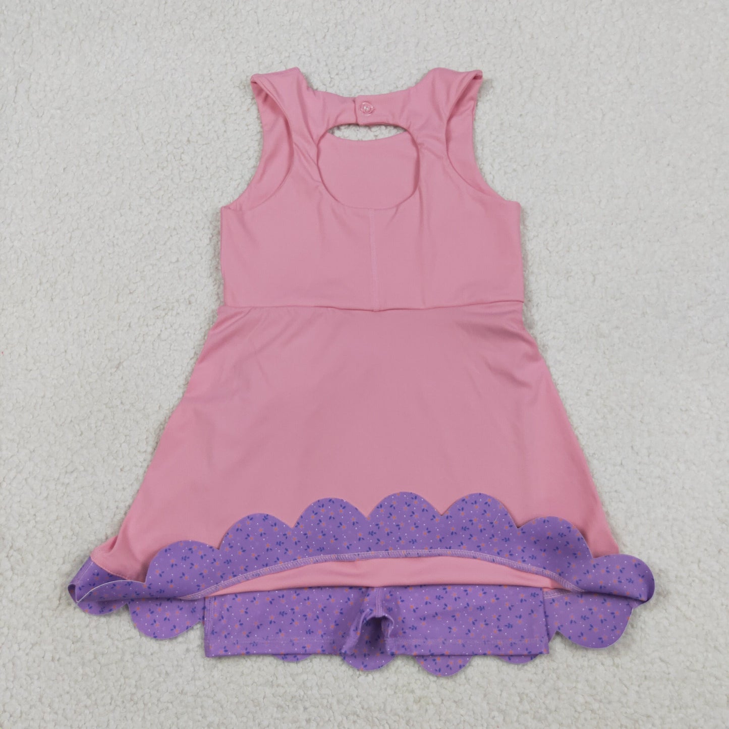 pink sleeveless athletic scallop dress