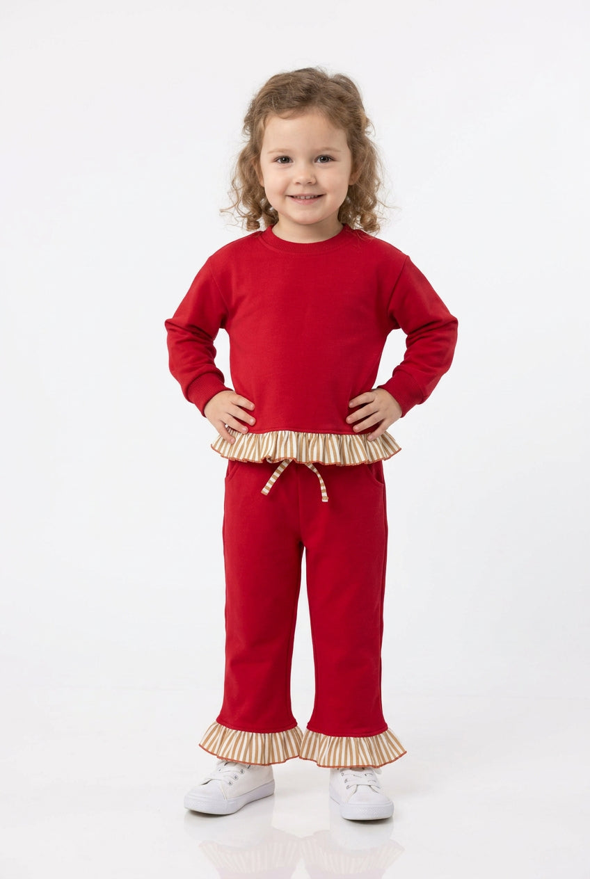 solid red outfit with ruffle striped trim