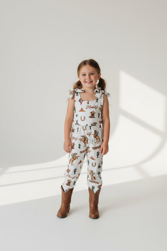 western howdy rodeo strap jumpsuit