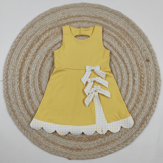 yellow sleeveless athletic scallop dress
