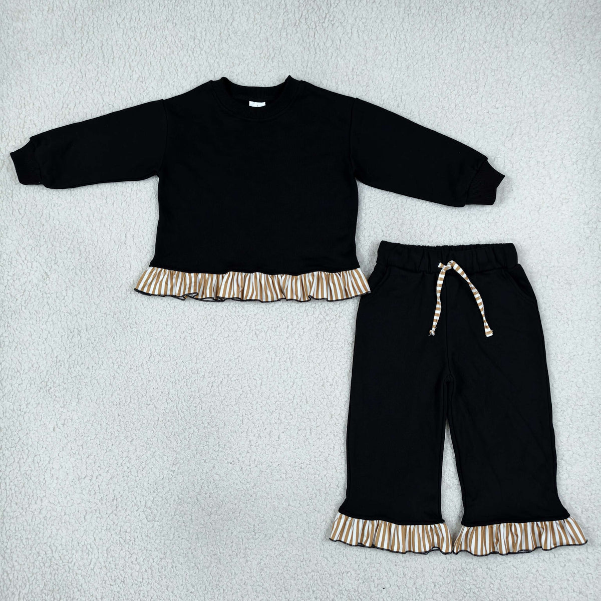 solid black outfit with ruffle striped trim girls clothing