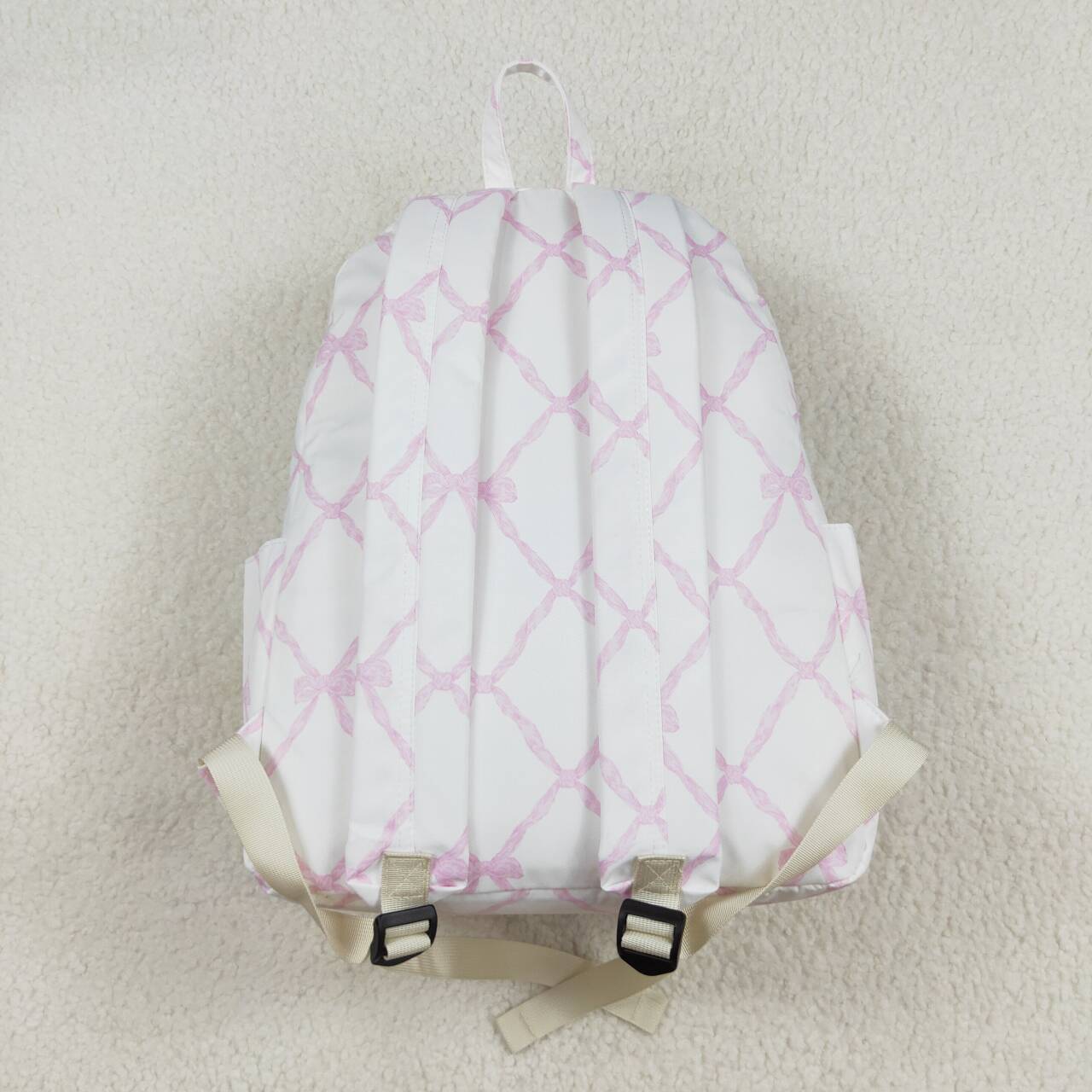 BA0225 Pink and white backpack with bow pattern  D 3.24