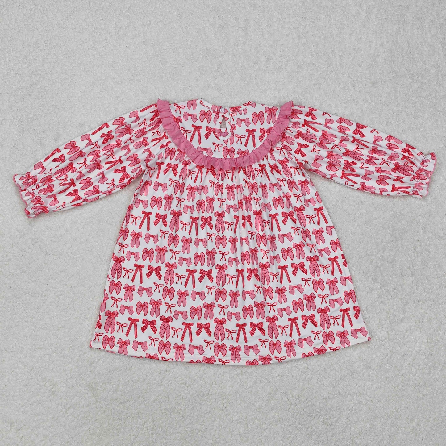 GLD0990  Pink and white long-sleeved top with bow pattern dress