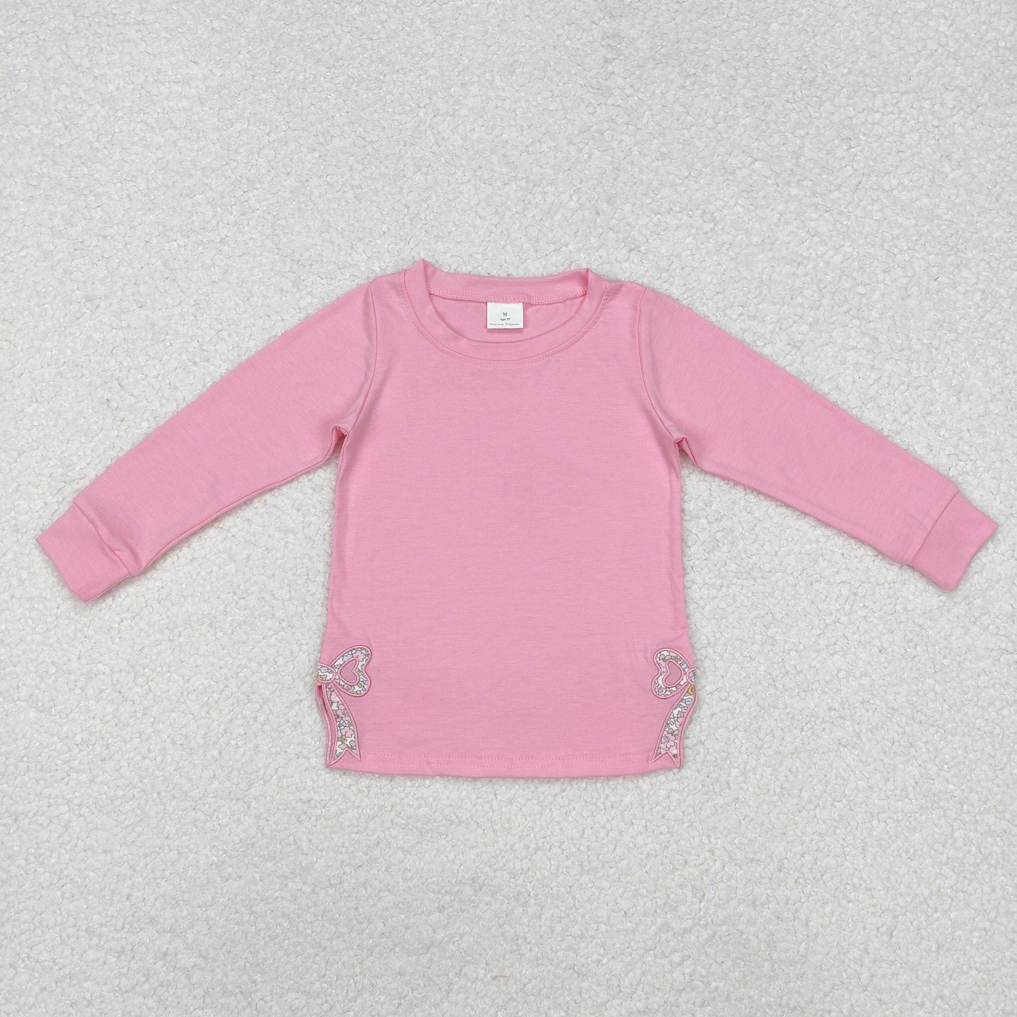 GT0872  Pink long-sleeved top with floral and bow pattern