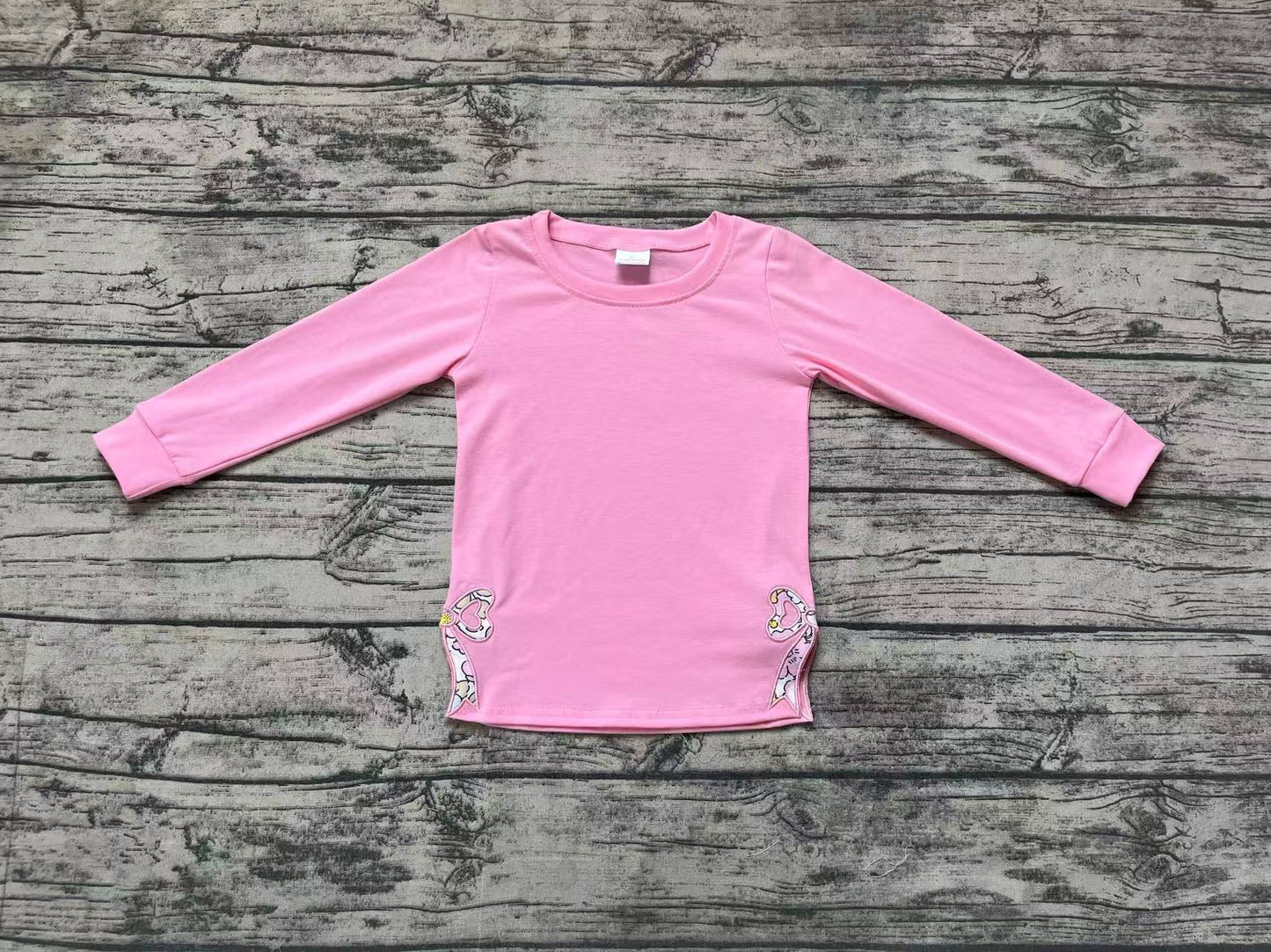GT0872  Pink long-sleeved top with floral and bow pattern