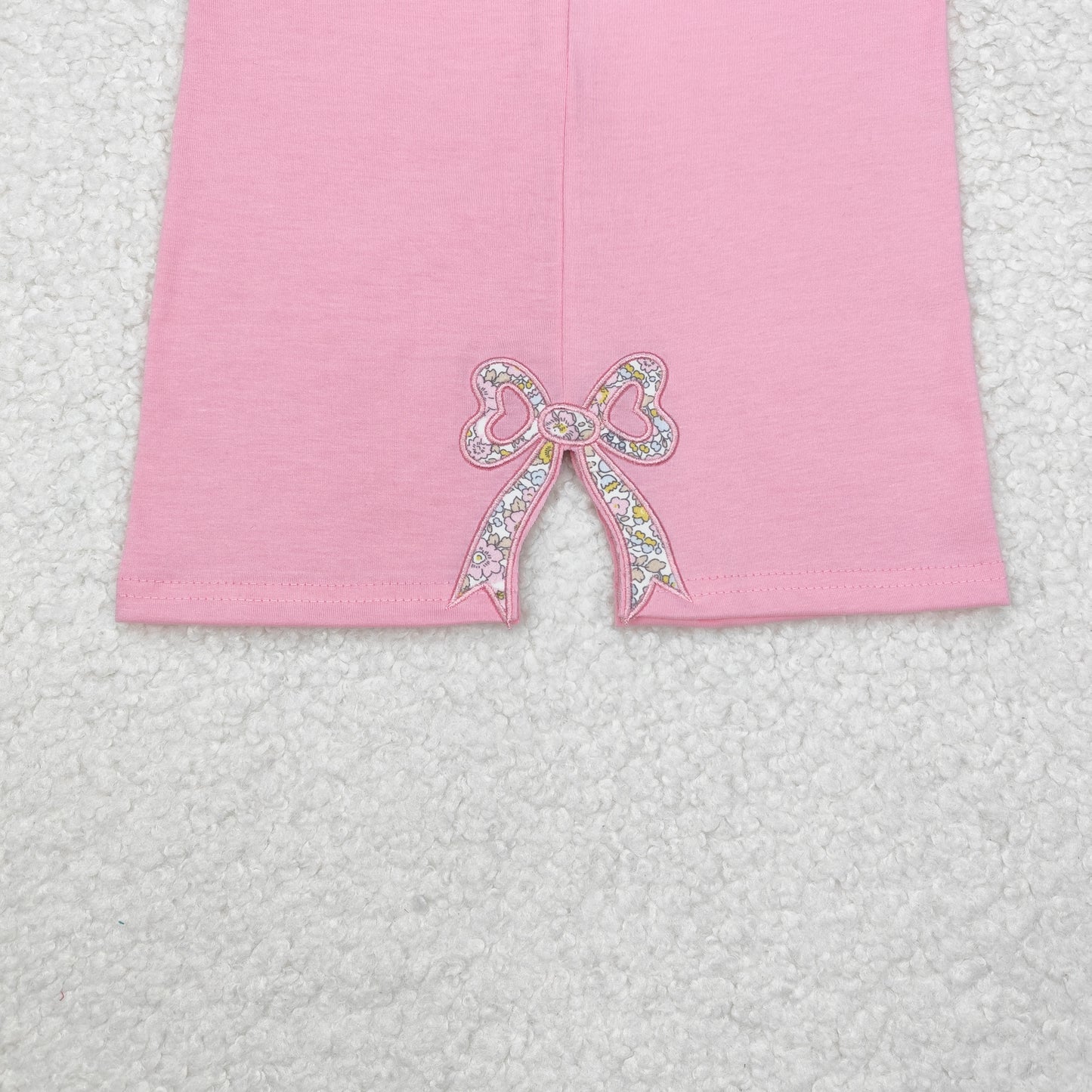 GT0872  Pink long-sleeved top with floral and bow pattern