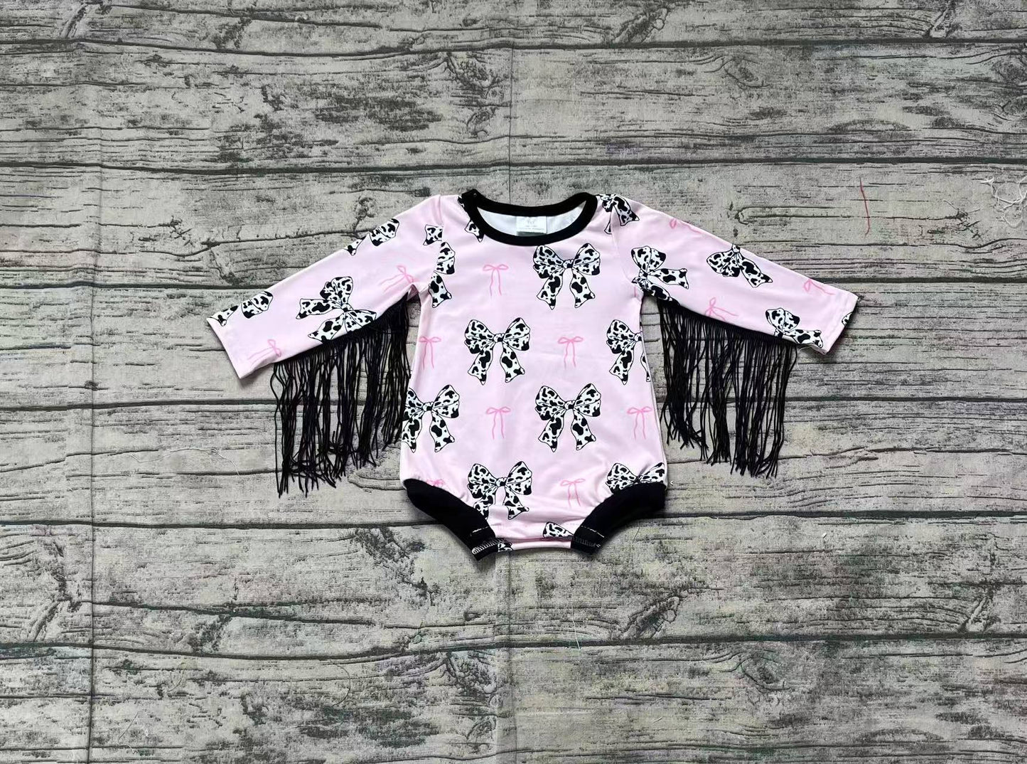 LR1824  Cow pattern bow pattern tassel pink and black long-sleeved jumpsuit  D 3.10