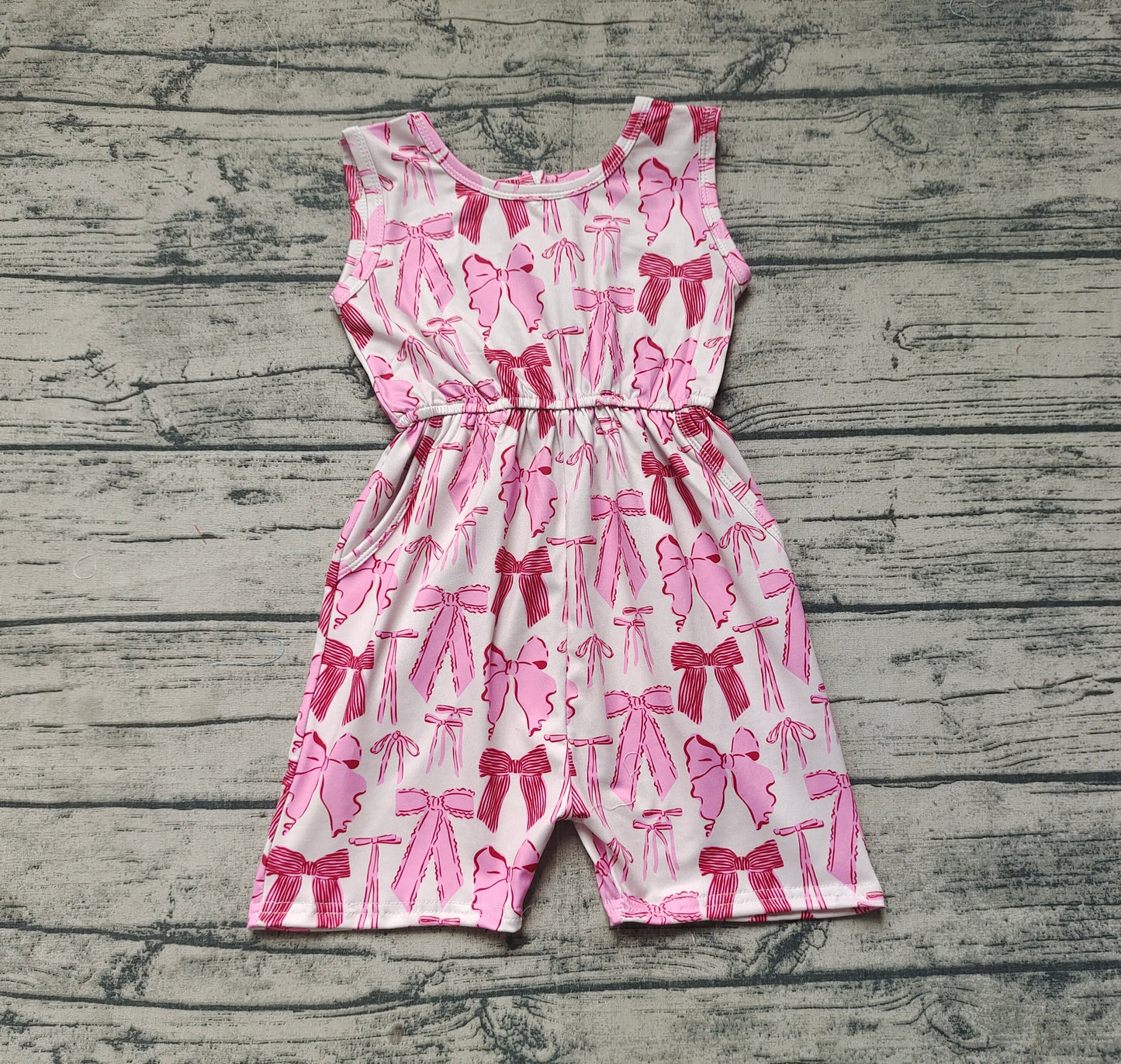 SR2670  Baby Girls Pink Bows Sleeveless Pockets Jumpsuits  D 3.27