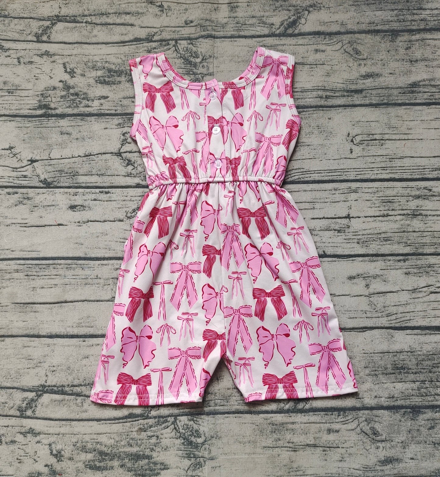 SR2670  Baby Girls Pink Bows Sleeveless Pockets Jumpsuits  D 3.27
