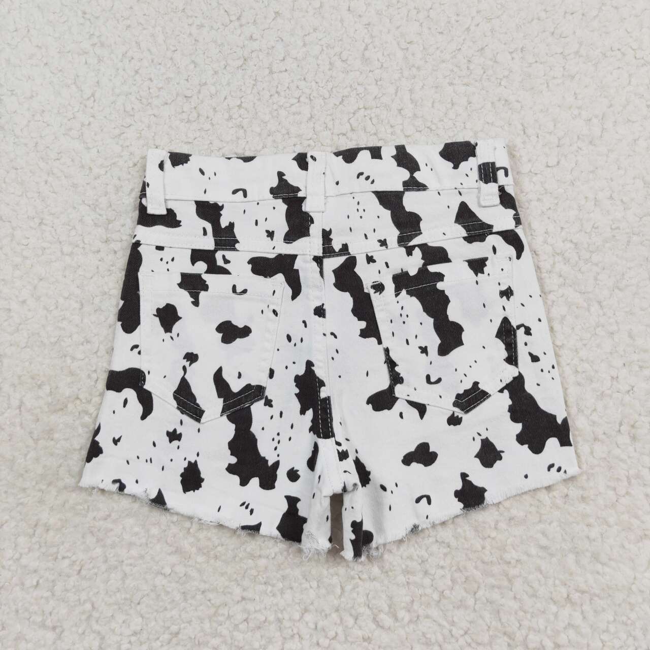 SS0332 White cow print ripped denim shorts