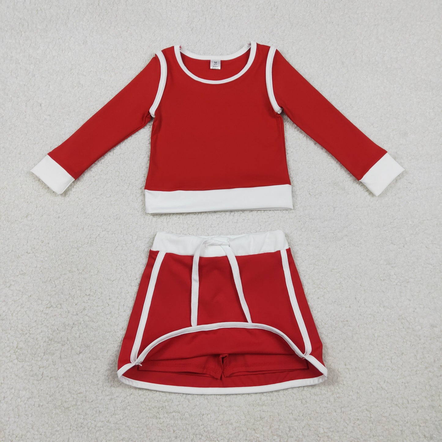 long sleeve solid red pullover skort set outfit