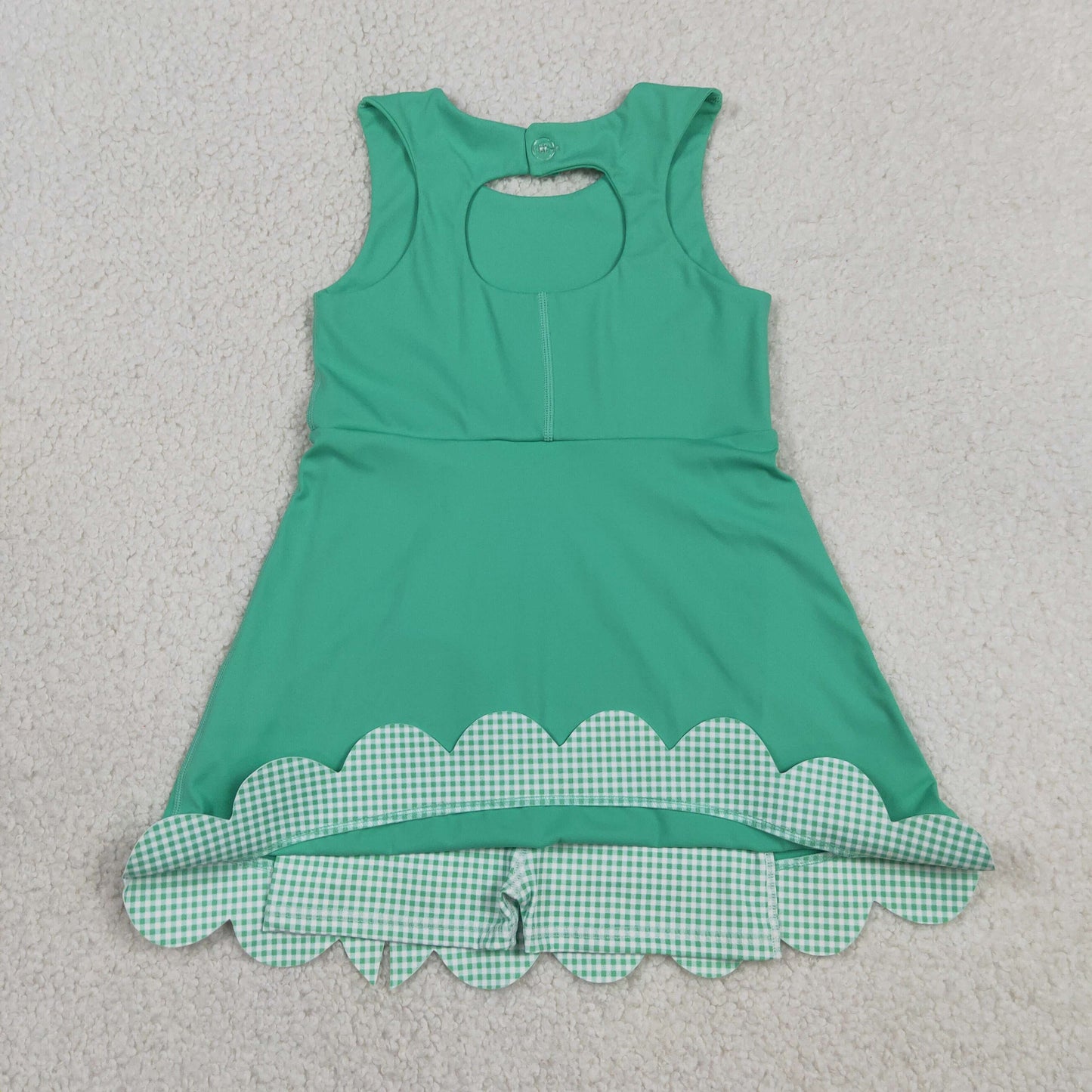 green sleeveless athletic scallop dress