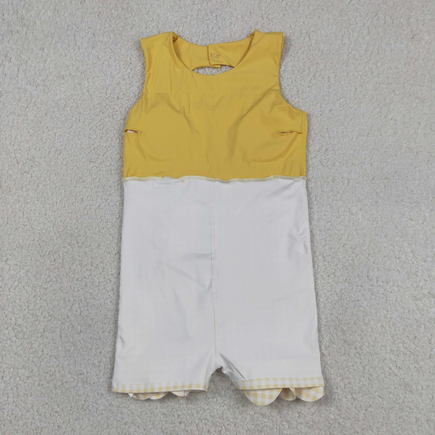 yellow sleeveless athletic scallop dress