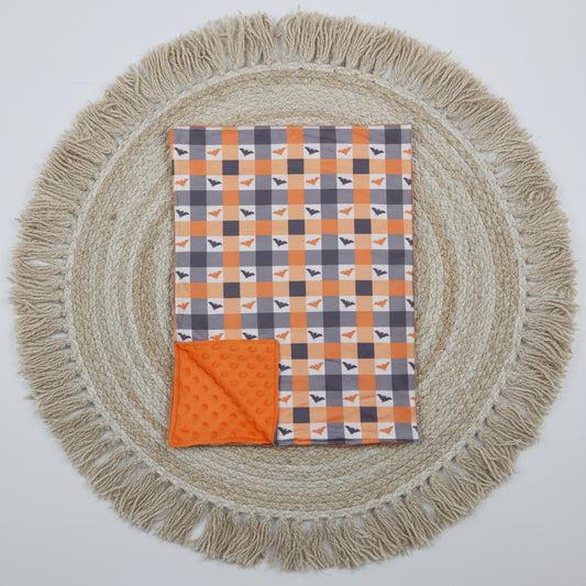 orange checkered with bat baby blanket