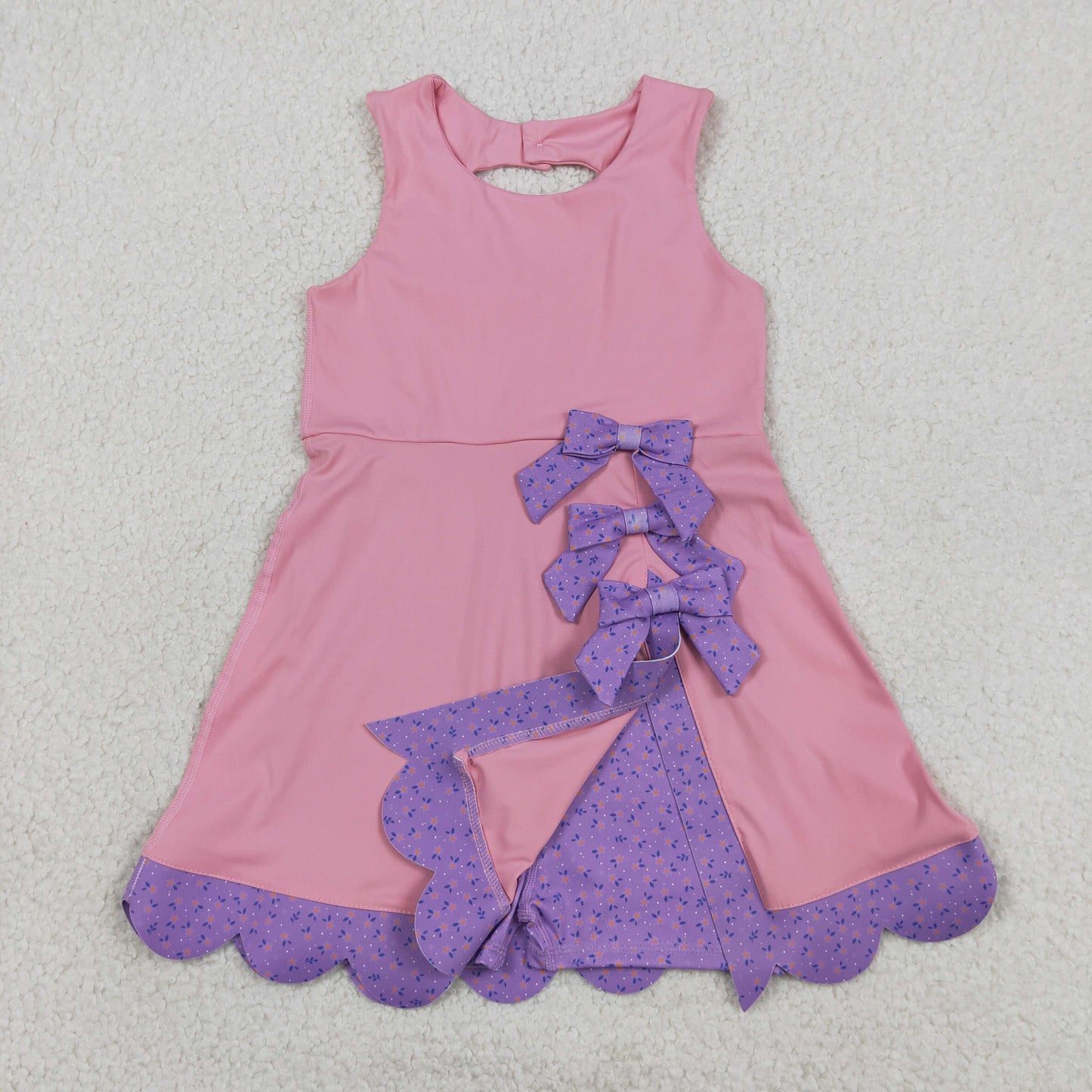 pink sleeveless athletic scallop dress