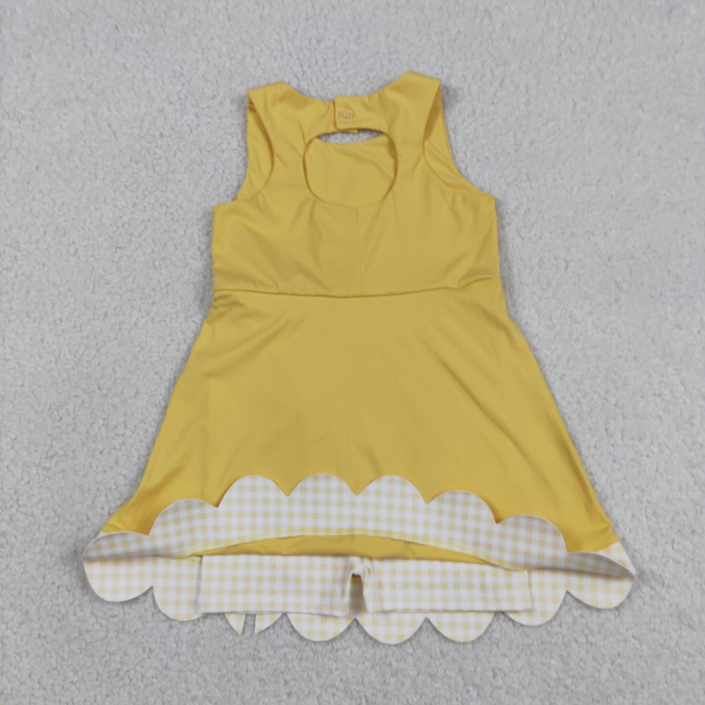 yellow sleeveless athletic scallop dress